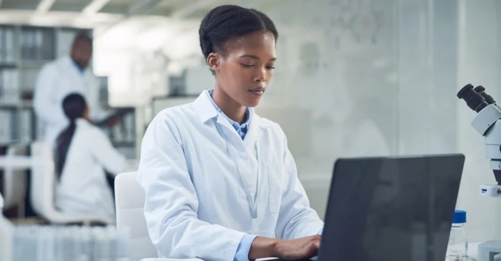 Female scientist on laptop